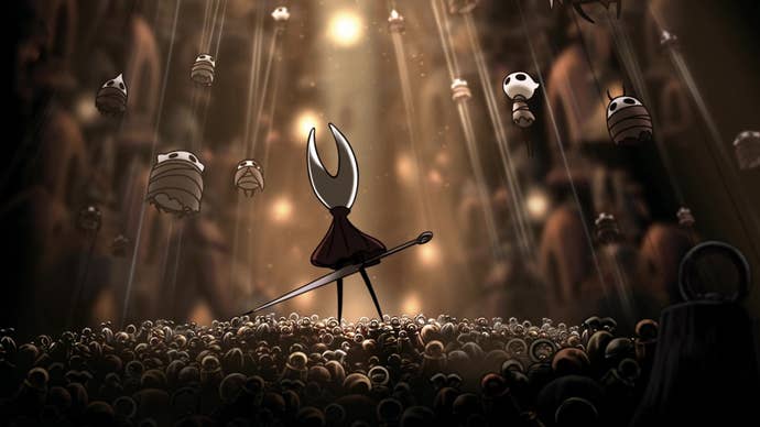 Hornet in a Hollow Knight: Silksong cutscene stands on a floor littered with bells and looks up at the inhabitants of Haunted Bellhart, strung up by cursed threads of silk.