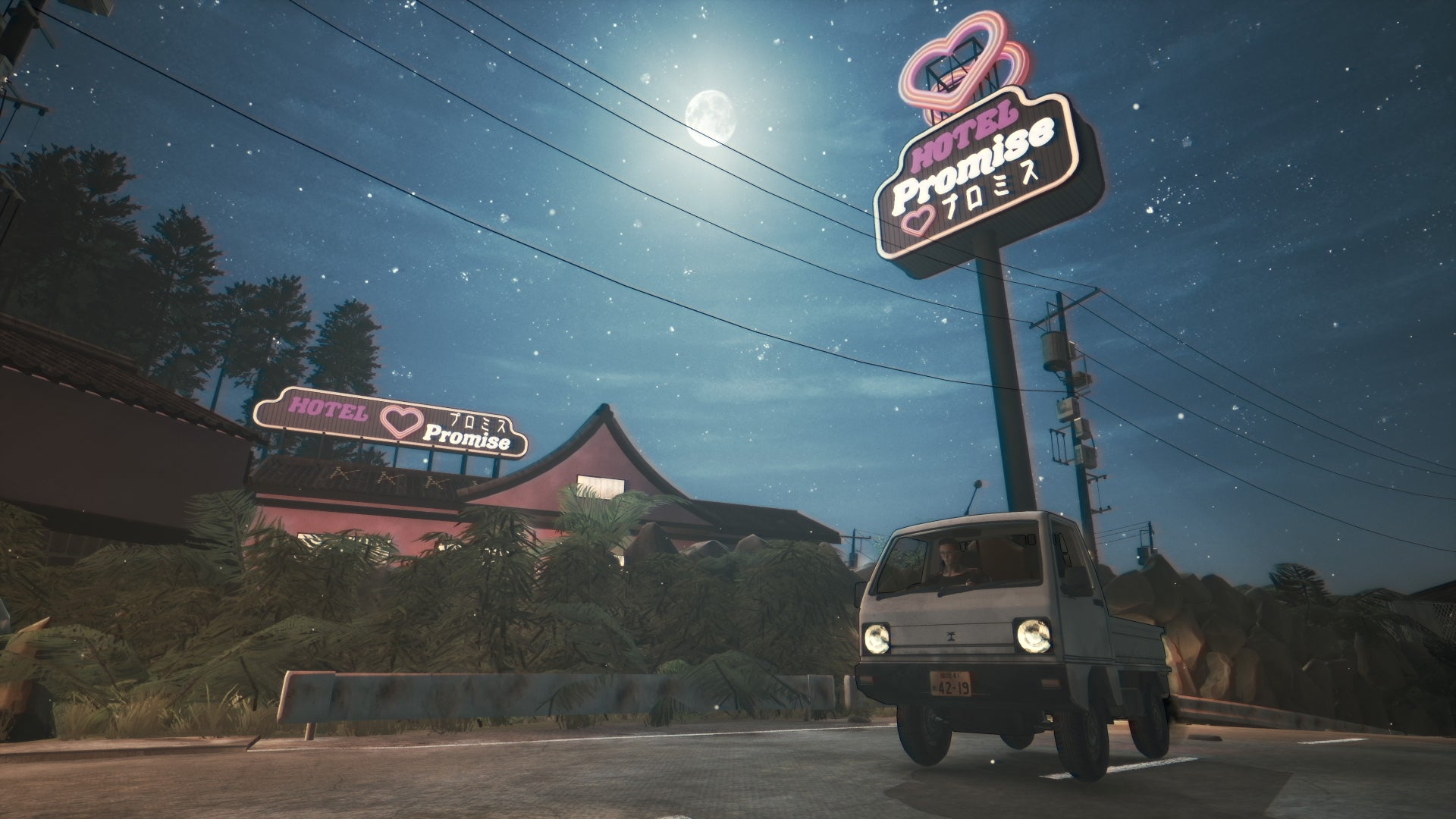 Michi sitting in his truck outside of the Promise Mascot Agency.